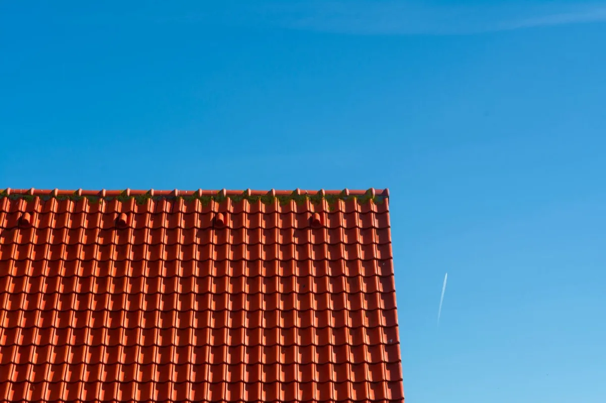 Tile roof gable in full sun, the kind of exposure that sets roof life in Meridian, ID